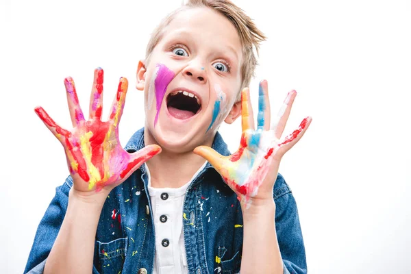 Excited schoolboy artist — Stock Photo