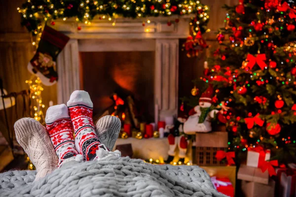 Legs in warm socks — Stock Photo