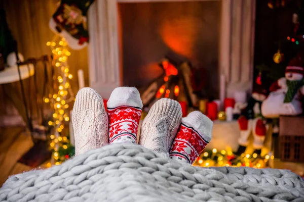 Legs in warm socks — Stock Photo