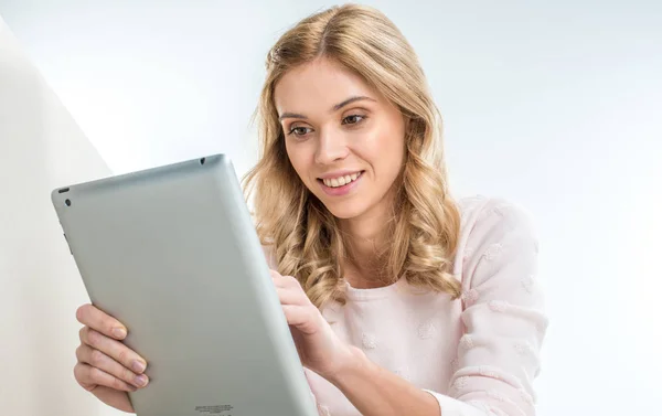 Woman using digital tablet — Stock Photo