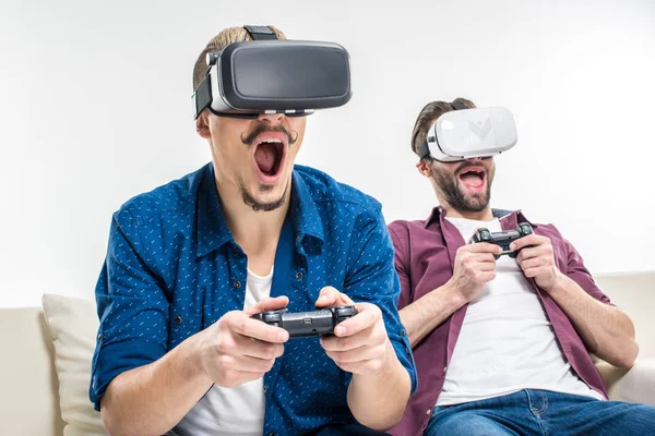 Friends in virtual reality headsets — Stock Photo