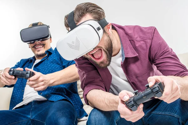 Friends in virtual reality headsets — Stock Photo