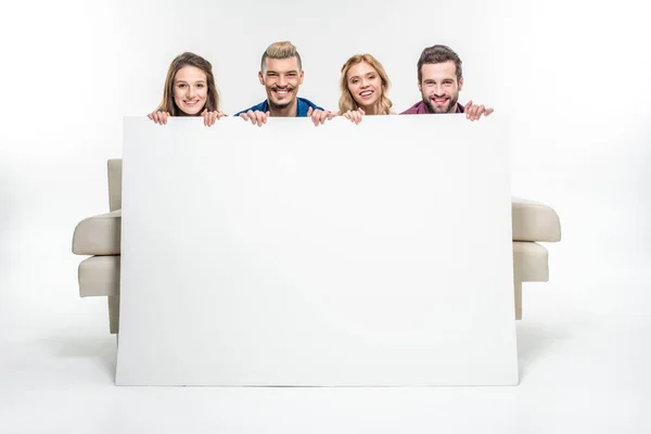 Friends holding blank card — Stock Photo