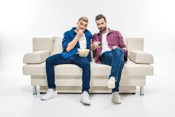 Male friends watching tv — Stock Photo