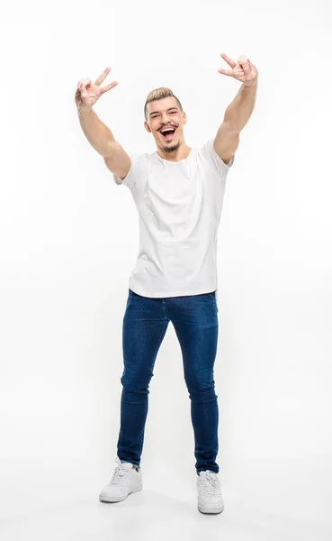Man showing victory signs — Stock Photo