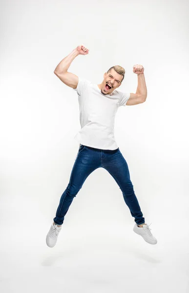 Exited man jumping — Stock Photo