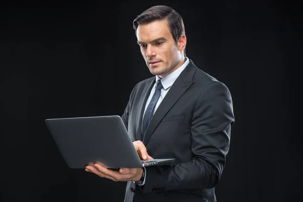 Businessman using laptop — Stock Photo