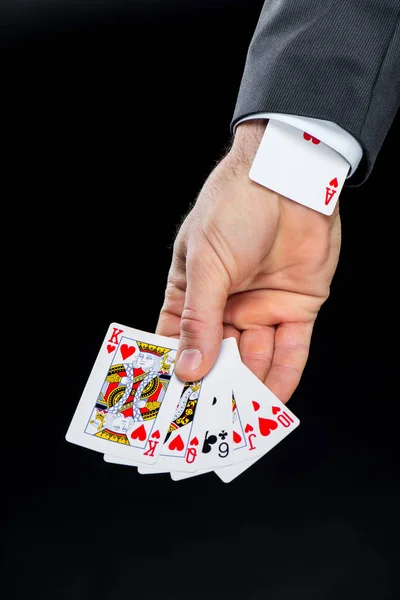 Man holding playing cards — Stock Photo