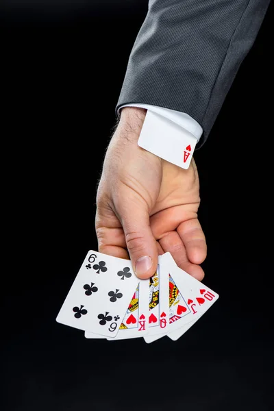 Homem segurando cartas de jogo — Fotografia de Stock