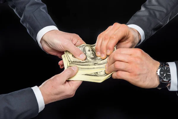 Businesspeople fighting for money — Stock Photo