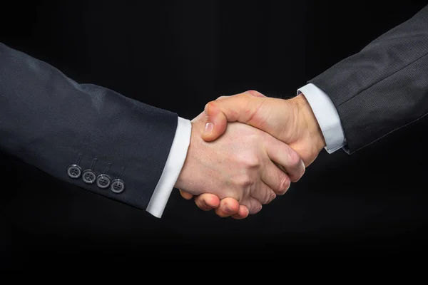 Businespeople shaking hands — Stock Photo