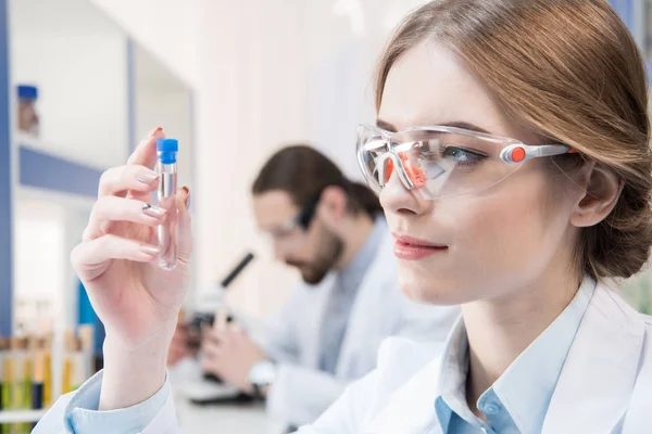 Attractive female scientist — Stock Photo