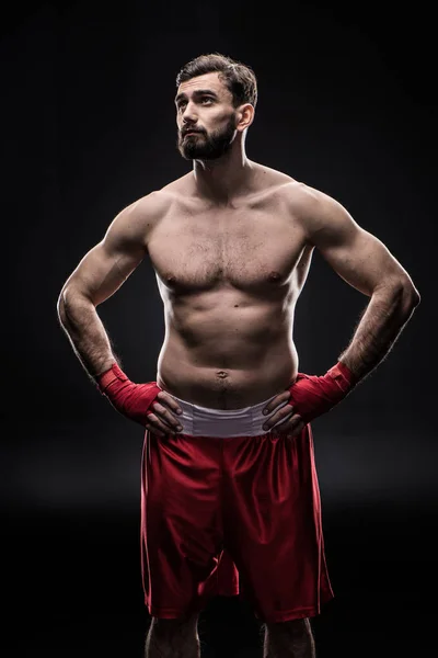 Boxer with wrapping hands — Stock Photo