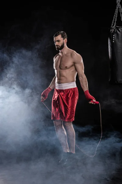 Young boxer skipping — Stock Photo