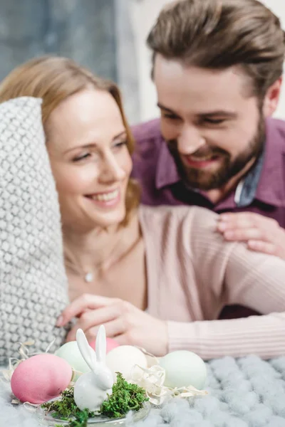 Couple with easter eggs — Stock Photo