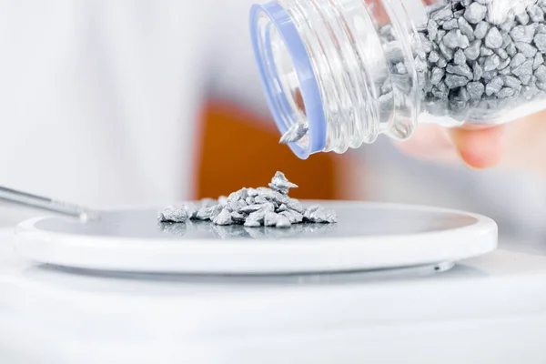 Reagent pouring from bottle — Stock Photo