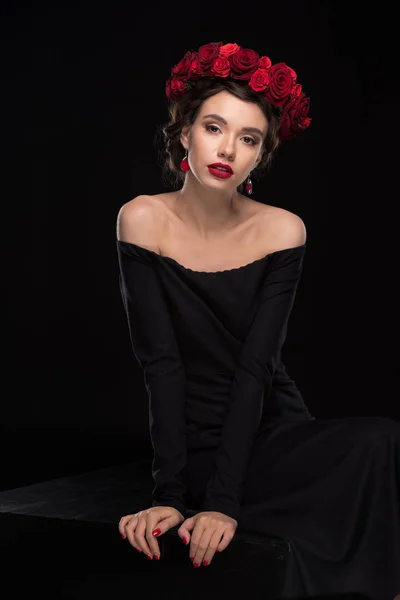 Woman with roses wreath on head — Stock Photo