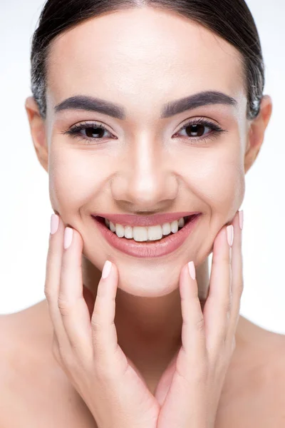 Beautiful woman touching face — Stock Photo