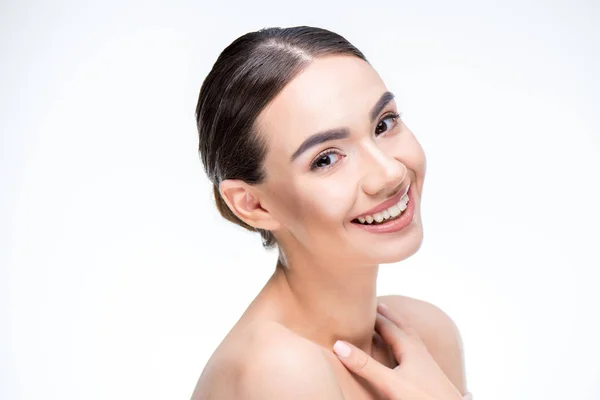 Woman smiling and looking at camera — Stock Photo