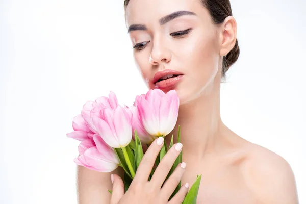 Woman with pink tulips bouquet — Stock Photo