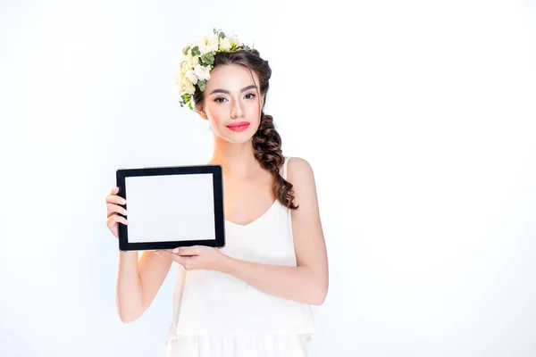 Woman showing digital tablet — Stock Photo