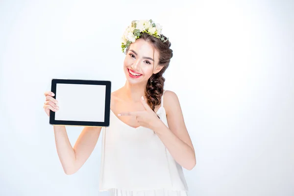 Woman showing digital tablet — Stock Photo