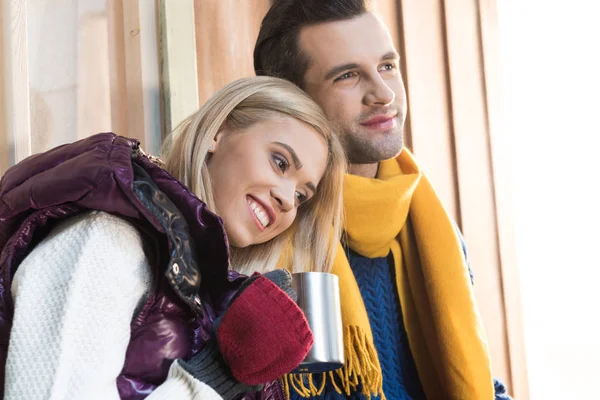 Happy young couple on porch — Stock Photo