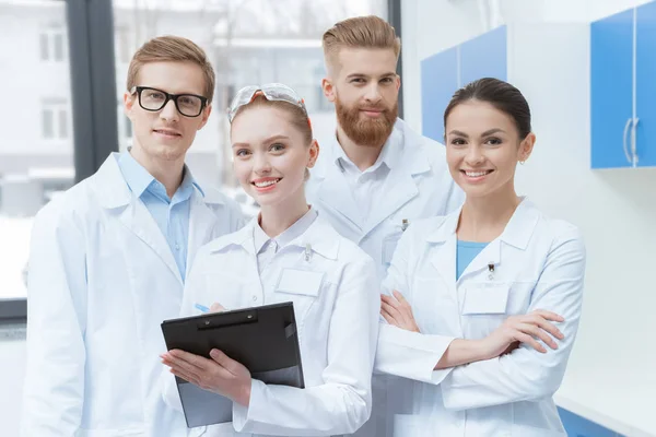Team of young scientists — Stock Photo