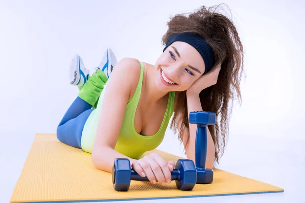 Sporty woman with dumbbells — Stock Photo