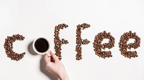 Word coffee from coffee beans — Stock Photo