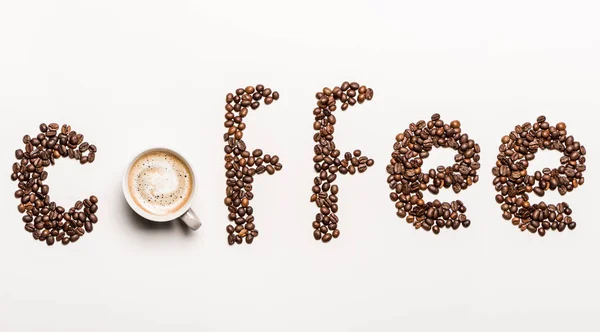 Word coffee from coffee beans — Stock Photo