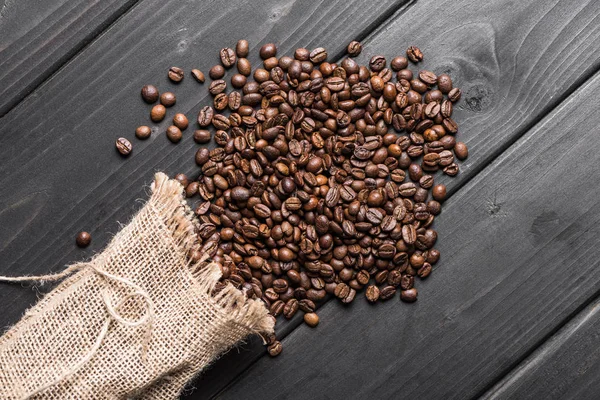 Coffee beans in sack — Stock Photo