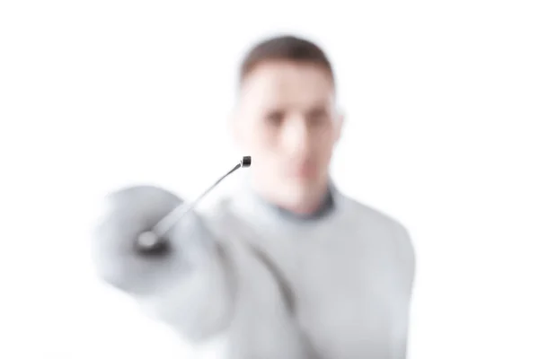 Young man fencing — Stock Photo