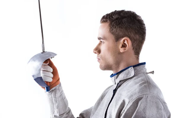 Young man fencing — Stock Photo