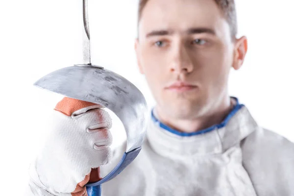 Young man fencing — Stock Photo