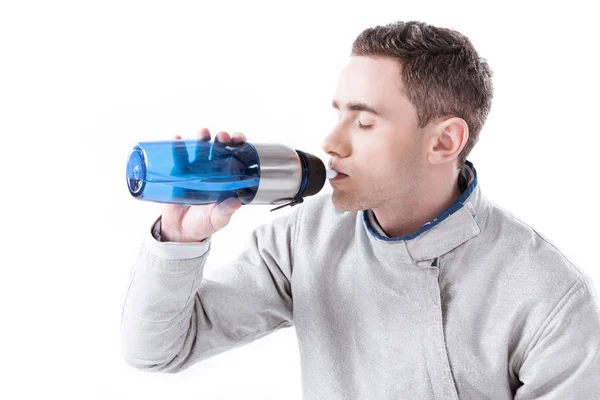 Fencer drinking water — Stock Photo