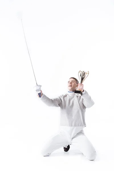 Fencer with champion 's goblet — стоковое фото