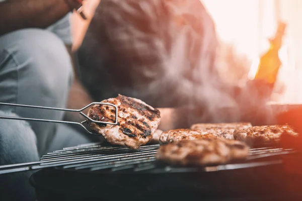 Meat preparing on grill — Stock Photo