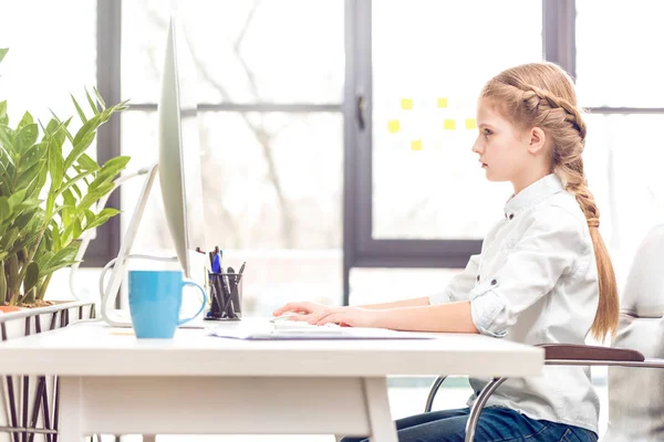 Little girl pretending to be businesswoman — Stock Photo