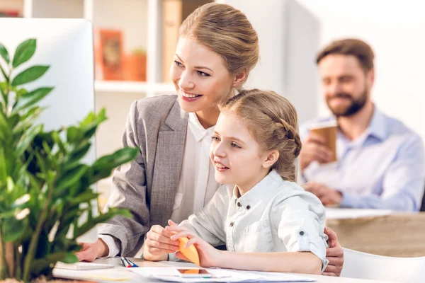 Mother and daughter hugging — Stock Photo