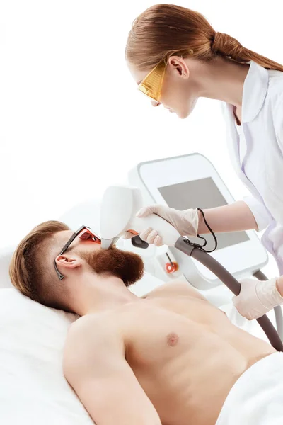 Man receiving laser skin care — Stock Photo