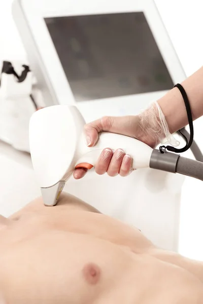 Man receiving laser skin care — Stock Photo