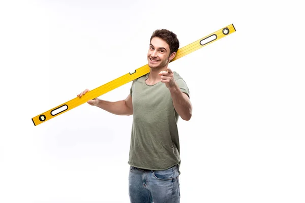 Man holding building level — Stock Photo