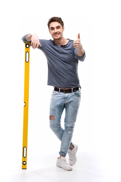 Man holding building level — Stock Photo