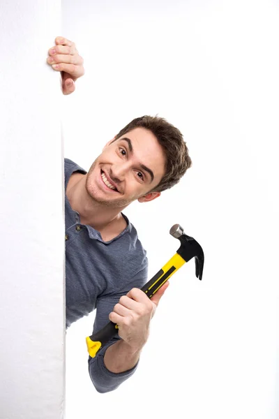 Homem segurando martelo — Fotografia de Stock