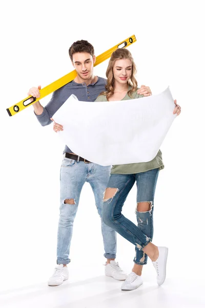 Young couple with blueprint — Stock Photo