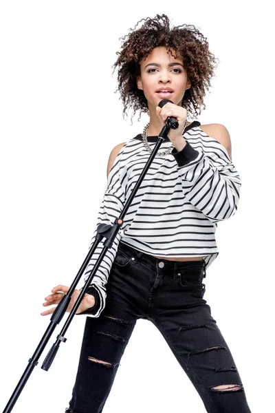 Young singer with microphone — Stock Photo