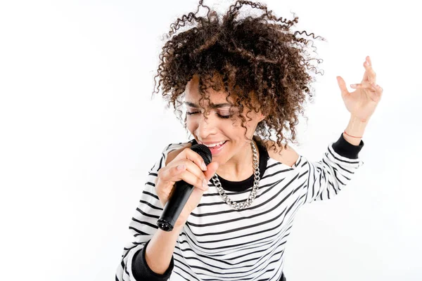 Young singer with microphone — Stock Photo