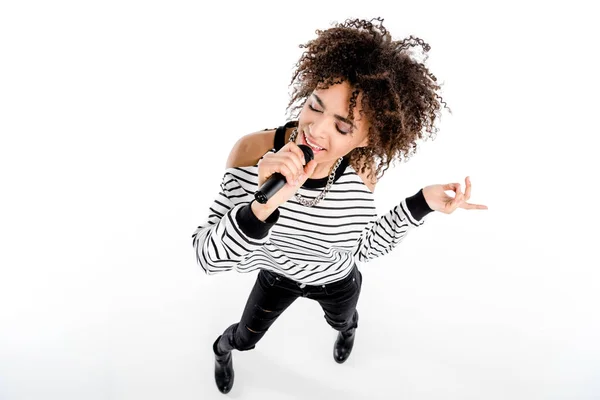 Young singer with microphone — Stock Photo