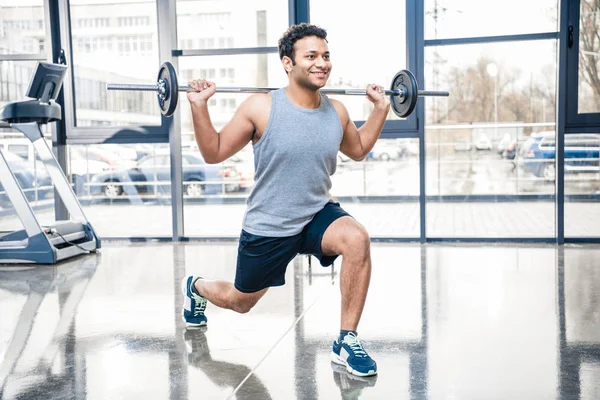 Man workout with barbell — Stock Photo